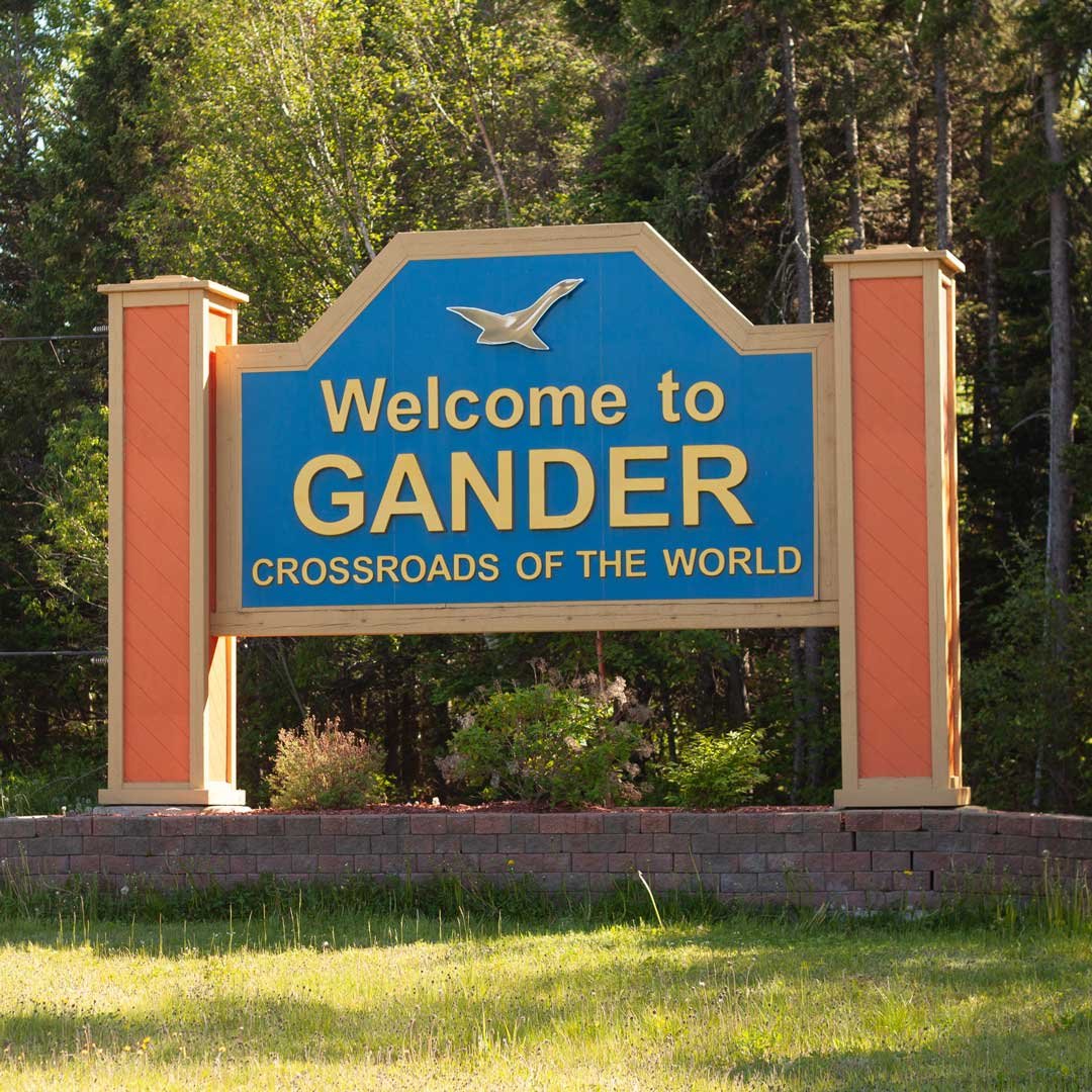 A Welcome to Gander sign.